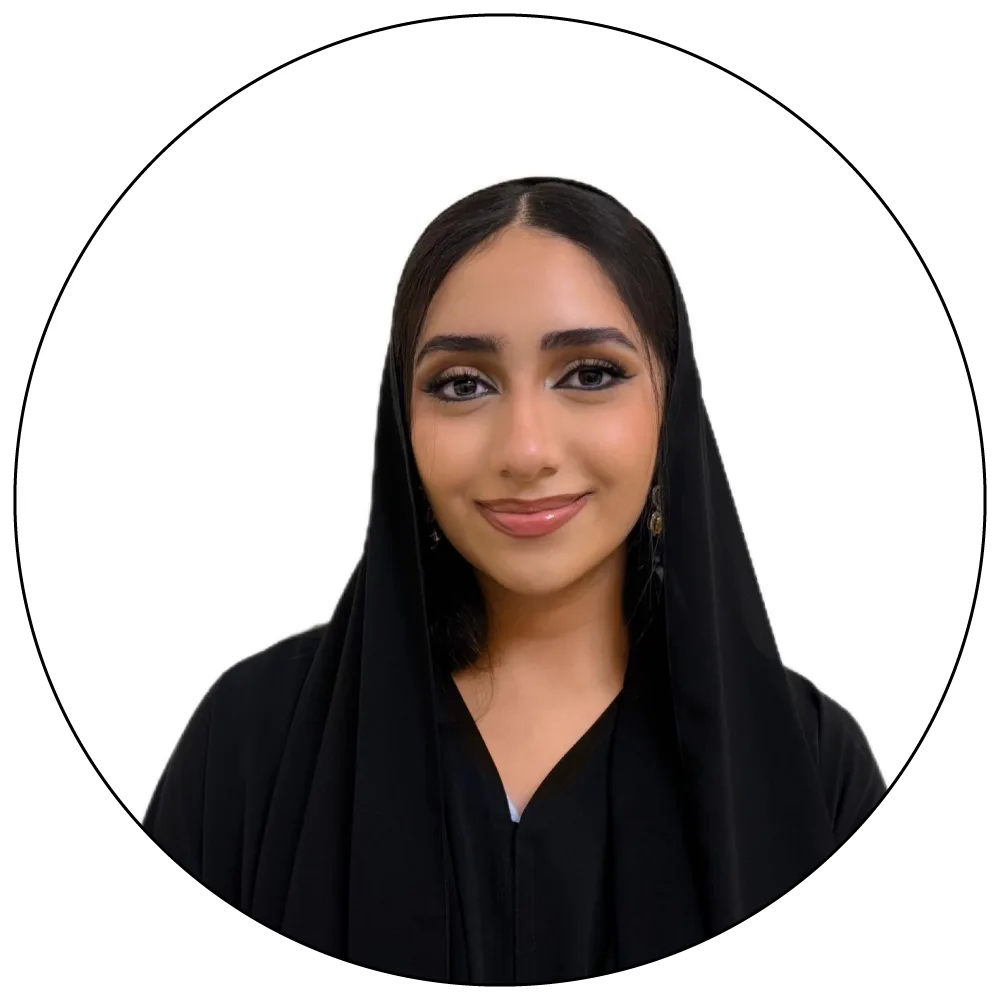 Smiling woman in black attire.